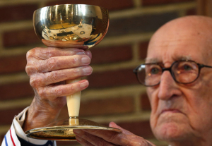 Father Jacques Clemens, 105, holds a mass at St. Benoit church in Nalinnes