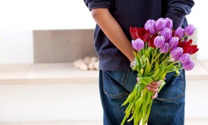 Man-brings-flowers-copy-e1422945443421-700x423